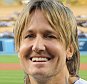 LOS ANGELES, CA - MAY 09:  Singer Keith Urban announces the starting lineup for the Los Angeles Dodgers before the game against the New York Mets at Dodger Stadium on May 09, 2016 in Los Angeles, California.  (Photo by Harry How/Getty Images)