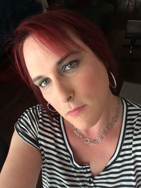 This July 2014 selfie image shows a transgender woman Kylie Jack in Austin, Texas, who was denied personal service at a lingerie shop known for one-on-one fittings. The 39-year-old computer interaction designer left empty-handed and angry after being asked if she was an anatomical female. She took to social media to protest.