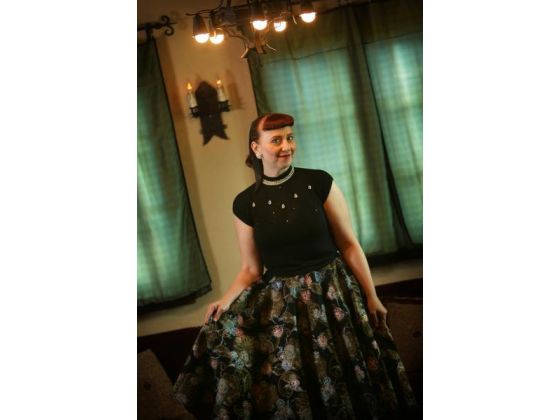 Erica Rayshel, 42, models at her Riverside one of her many ‘50s outfits she loves to wear. A collector since age 18, she has more than 1,000 pieces, ranging from jewelry to hats. A teacher, puts together authentic period outfits to wear every day.