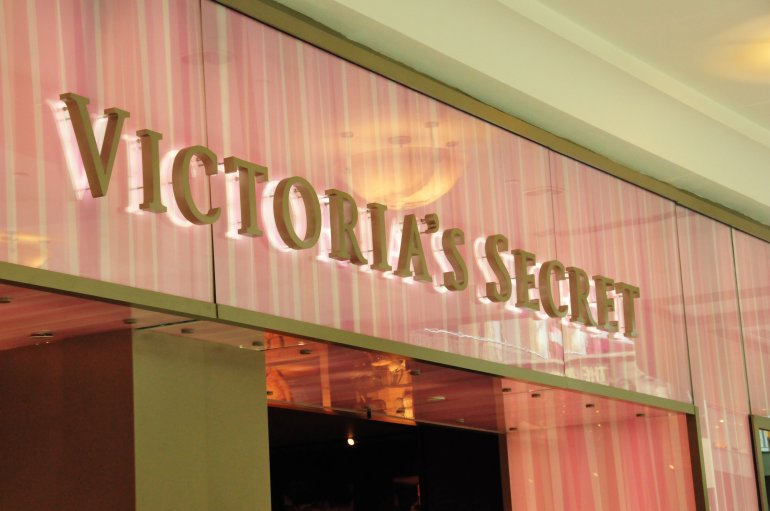 Victoria's Secret is laying off workers and restructuring its business to streamline its focus on its famous lingerie, with an eye towards Millennials.