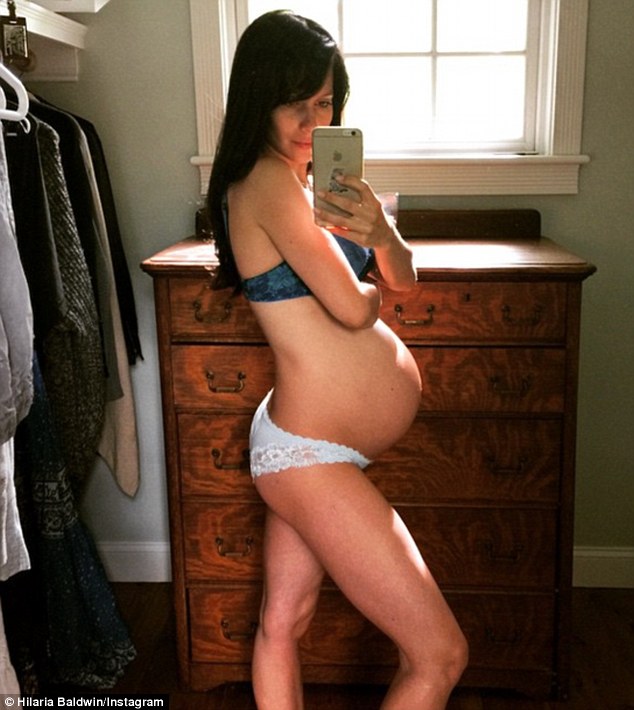 'A bit bigger!' Pregnant Hilaria Baldwin shared yet another lingerie-clad snap of her growing baby bump on Wednesday