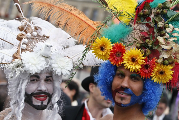 Guests arrive for the opening ceremony of the 22nd Life Ball in Vienna May 31, 2014. Life Ball is Europe's largest annual AIDS charity event and takes place in Vienna's city hall. (Leonhard Foeger/Reuters)