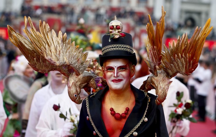 A guest arrives for the opening ceremony of the 22nd Life Ball in Vienna May 31, 2014. Life Ball is Europe's largest annual AIDS charity event and takes place in Vienna's city hall. (Leonhard Foeger/Reuters)