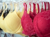 bras hanging on rack