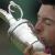 Rory McIlroy plants one on the Claret Jug after winning Sunday’s British Open.