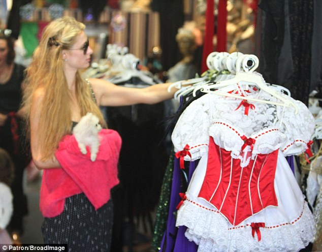 Scariest outfit you can find? Come off it, Paris! Hilton was spotted in the Trashy Lingerie store in West Hollywood on Saturday, and perused a number of revealing ensembles - including a French Maid outfit