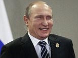 epa05027780 Russian President Vladimir Putin smiles  after meeting with Italian Prime Minister Matteo Renzi during  G20 summit in Antalya, Turkey, 16 November 2015.  In addition to discussions on the global economy, the G20 grouping of leading nations is set to focus on Syria during its summit this weekend, including the refugee crisis and the threat of terrorism.  EPA/YURI KOCHETKOV