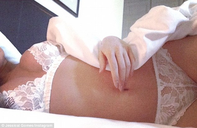 White hot! The 28-year-old Australian posted a second sultry snap of herself in an all lace white bra and matching briefs