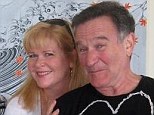 Close friends: Rebecca Erwin Spencer and Robin Williams in this undated picture from the Facebook account of the comedian's personal assistant