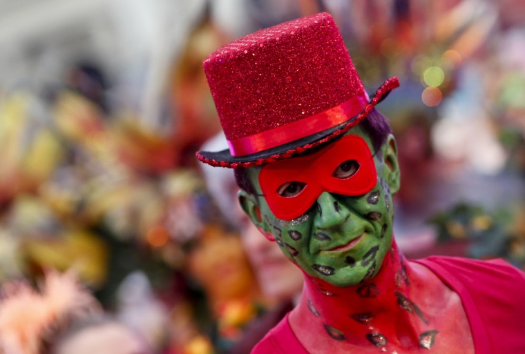 A guest arrives for the opening ceremony of the 22nd Life Ball in Vienna May 31, 2014. Life Ball is Europe's largest annual AIDS charity event and takes place in Vienna's city hall. (Leonhard Foeger/Reuters)