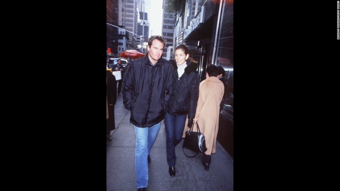 Crawford walks in New York with her second husband, businessman Rande Gerber. The couple has two children.