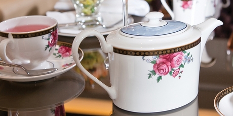 Head to the Langham for a traditional afternoon tea. 