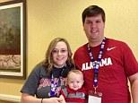 Loss: Cooper Harris, pictured with his parents Justin Ross and Leanna, had been switched out of a seat that might have been easier for his father to see him in the back of the sweltering car