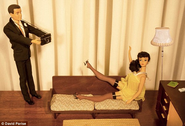 Sultry snaps: These dolls take sexy pictures the old-fashioned way - with a real camera - in the vintage-inspired scene