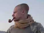 AWOL: Bowe Bergdahl, pictured with pipe in mouth manning an observation post months before his disappearance, left a note telling his fellow soldiers that he was leaving to start a new life, did not want to fight for America and did not believe in war