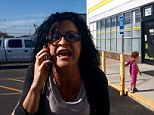 'Mother of the year she's not': Janelle Ambrosia, a stripper from Buffalo, New York, is seen in a viral YouTube video hurling racist epithets at a black man in front of her two young kids