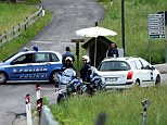 Investigation: Italian Police closed a road following an accident near Germany's national football team's training camp in San Martino