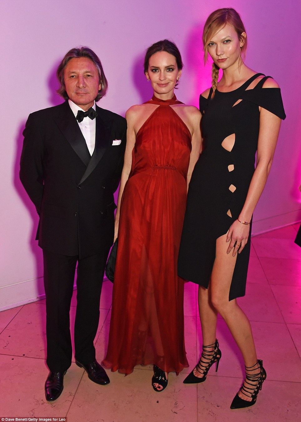 Head's above the rest: The towering catwalking queen made married couple Leon and Yana Max look petite in comparison to her