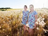 Two of a kind: Ten-year-old Kitana and Tahuana Schmitt are just one of some 700 twins in the town of 6,600 residents