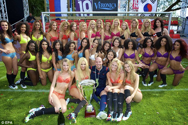 All smiles: Players pose for a photo following the Lingerie World Cup which took place on Saturday