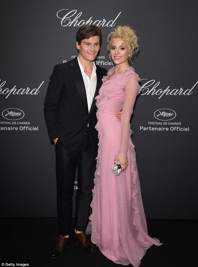 In the pink: Flying the flag for the Brits was songstress Pixie Lott who stormed the red carpet alongside her dashing long-term boyfriend Oliver Cheshire