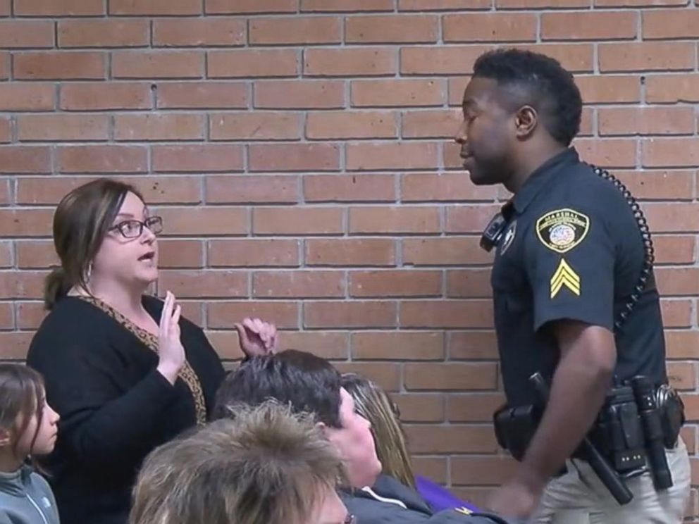 PHOTO: A video obtained by KATC shows teacher, Deyshia Hargrave, being handcuffed and removed from a school board meeting at Vermilion Parish in Louisiana.