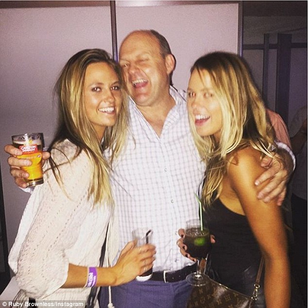 Ruby, 18, (left) is pictured here with her father (centre) and older sister Lucy, 20, (right)