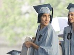 Emma Sulkowicz carries her mattress at the Columbia University graduation ceremony