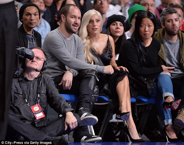 Cannot get enough: The ARTpop artist kept her eye on the ball