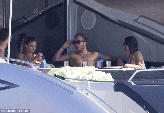 The aftermath: Gotze was with pals on the extravagant boat after winning the World Cup for Germany