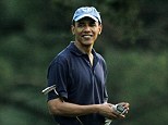 Now it all makes sense: Obama smiled on the 10th fairway at the Grove Park Inn Resort in Asheville during a round on April 23, 2010