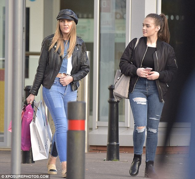 Splashing the cash: Perrie's retail therapy session looked to have been a successful one as she departed Newcastle's Gateshead's Metro Centre with an array of shopping bags