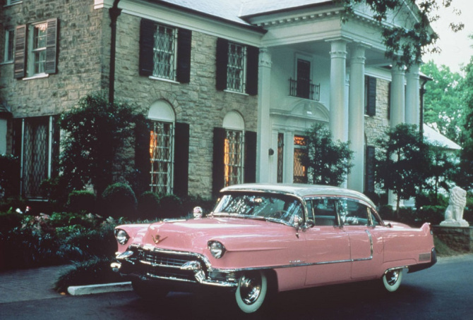 Editorial Use Only. Consent Required for Commercial Use and Book Publications Mandatory Credit: Photo by News Ltd/Newspix/REX/Shutterstock (846105a) Elvis Presley's Graceland home with a 1955 Cadillac motor vehicles. Graceland, home of singer Elvis Presley in Memphis, America - 1970s