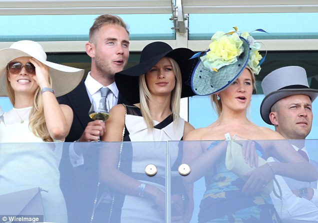 Giddy up: Stuart Broad, Bealey Mitchell and Jonathan Trott lap up the racing on Derby day