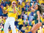 Popstar Jennifer Lopez helped kick off celebrations at the World Cup opening ceremony at the Arena de Sao Paulo in Brazil last night. She was joined by rapper Pitbull (main picture) as she performed the official World Cup song 'We Are One (Ola Ola)'. Despite joy for Brazilians (top right) at their team's opening night win over Croatia, and a carnival atmosphere around the host country (bottom right), viewers in Britain were left furious that poor sound quality left them unable to hear the tournament's heavily-hyped anthem.