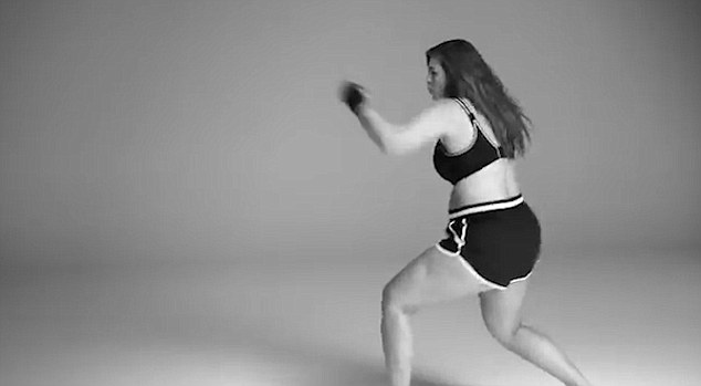 Fighter: Ashley is seen kick boxing in a sports bra and shorts while saying: 'This body is made for being bold, powerful and sexy'