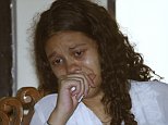 Heather Mack from Chicago, Ill., weeps in a courtroom as she witnesses her trial in Bali, Indonesia, Thursday, March 12, 2015. Mack, 19, charged with premeditated murder in the death of her mother on Indonesia's Bali island told a court Wednesday that her boyfriend killed her mother in anger after she threatened to kill their unborn baby. (AP Photo/Firdia Lisnawati)