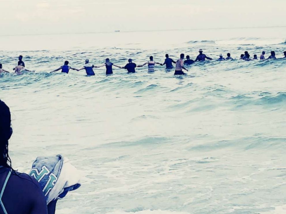 PHOTO: A group of strangers linked arms and waded into the ocean to rescue a group of swimmers stranded off the coast of Panama City Beach, Fla., July 8, 2017.