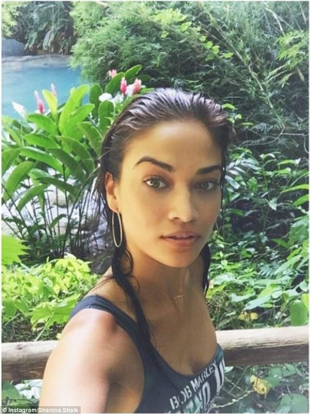 Selfie! Clearly admiring her own tan, Shanina couldn't resist taking a selfie in a low-cut, navy tank top