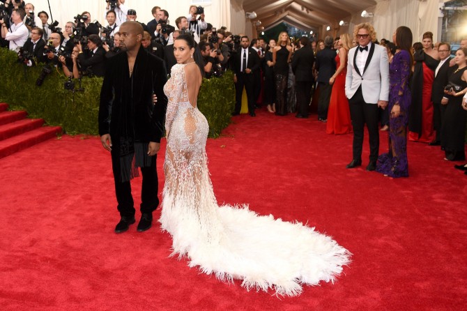 NEW YORK, NY - MAY 04: Kim Kardashian West (R) and Kanye West attend the China: Through The Looking Glass Costume Institute Benefit Gala at the Metropolitan Museum of Art on May 4, 2015 in New York City. (Photo by Larry Busacca/Getty Images)