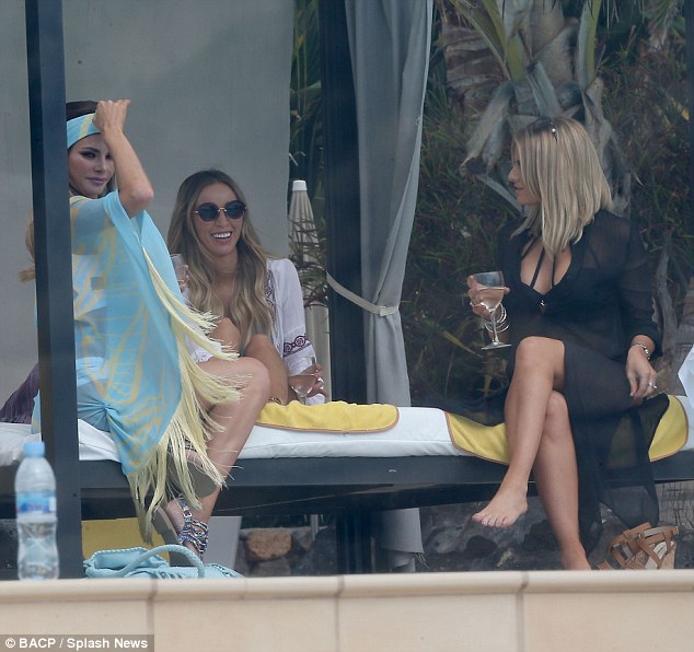 Old glamour: Chloe was attired in a perfect powder blue and lemon yellow kaftan with a matching headband