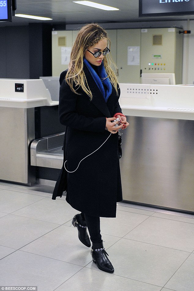 Leaving again: Mariah was spotted leaving Italy after only a short stop on Friday