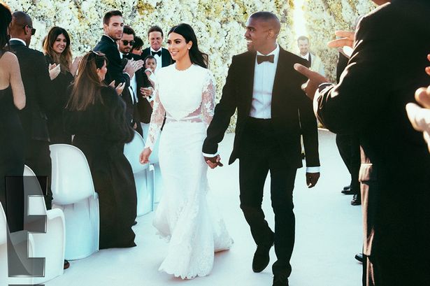 Kim Kardashian and Kanye West at their wedding in Florence, Italy