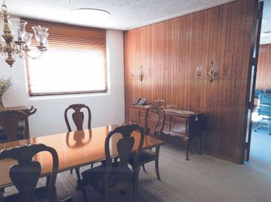 PHOTO: A photo in documents provided by HUD to ABC News shows the table and chairs in a dining room adjacent to Sec. Ben Carsons office.