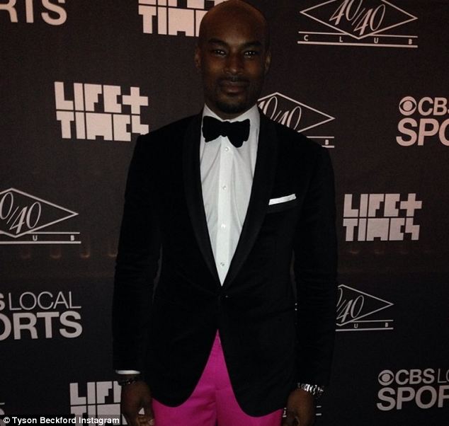 Making a statement: It looks like Tyson also had heads turning on the night in a pair of bright pink trousers