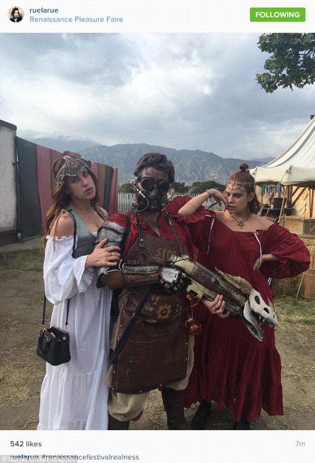 Strike a pose: Scout (far left) wore a flowing white dress and decadent headband as her younger sister Tallulah (far right) wore a deep red dress  dark mauve lipstick